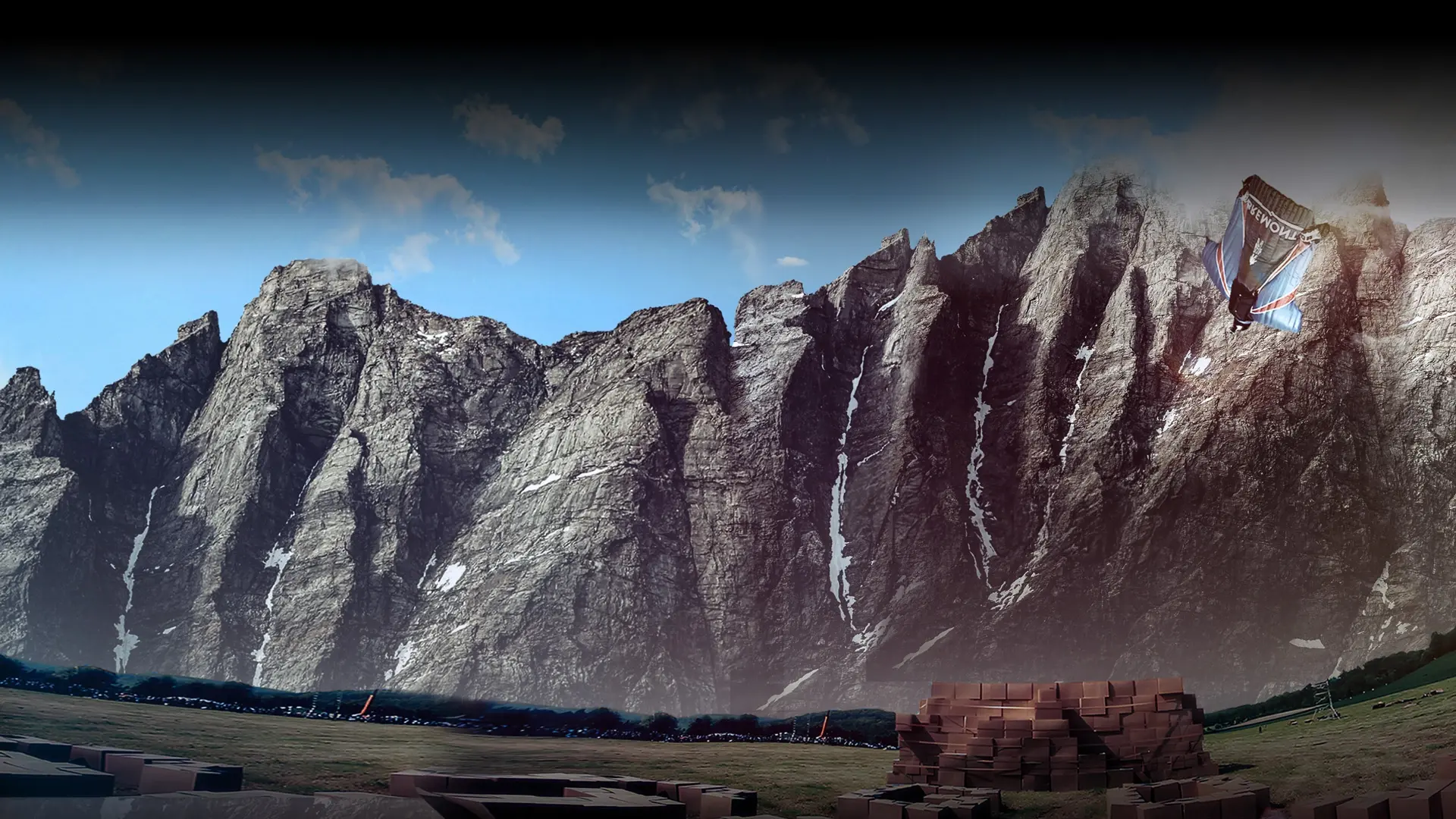 Gary Connery in wingsuit flying past Norwegian cliffs above the cardboard box landing site, The Man Who Flew to Earth